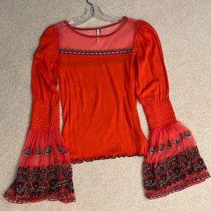 Free People orange lightweight sweater top.